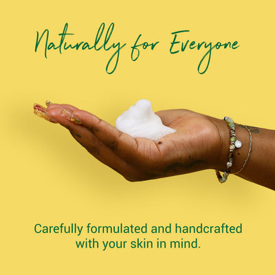 lemon foaming hand soap in hand | carefully formulated | naturally for everyone | herb'neden